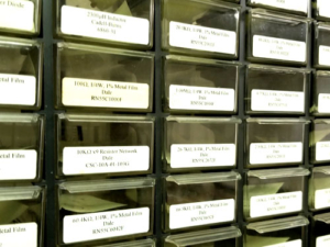 drawers-of-electronic-parts Electronic parts in drawers at EG Controls.